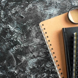 top-view-school-supplies-dark-su.jpg