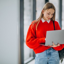 girl-student-with-laptop-standin.jpg
