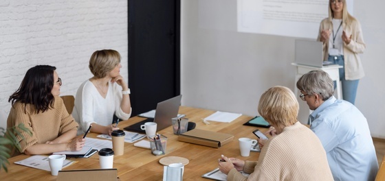 medium-shot-woman-leading-business-meeting.jpg