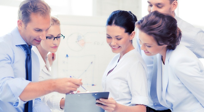 smiling-business-team-discussing (1).jpg
